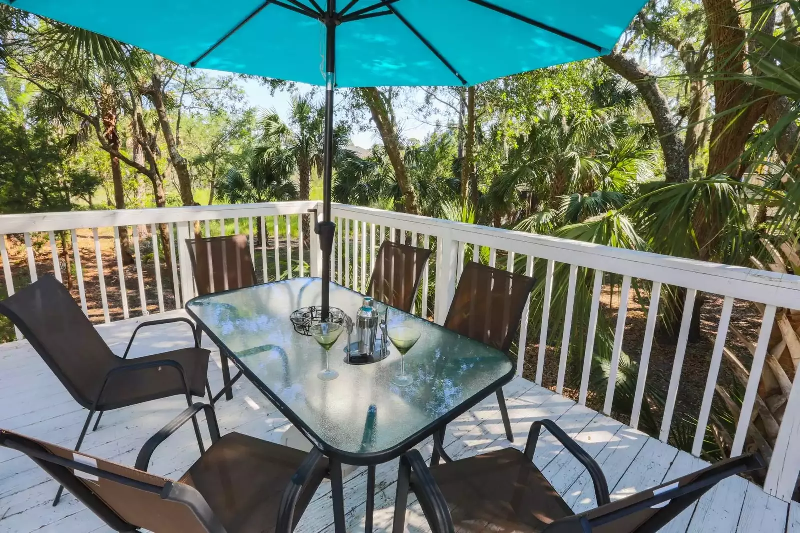It is 5:00 somewhere!  You'll have plenty of opportunity to enjoy a cocktail on one of the home's 3 elevated porches.