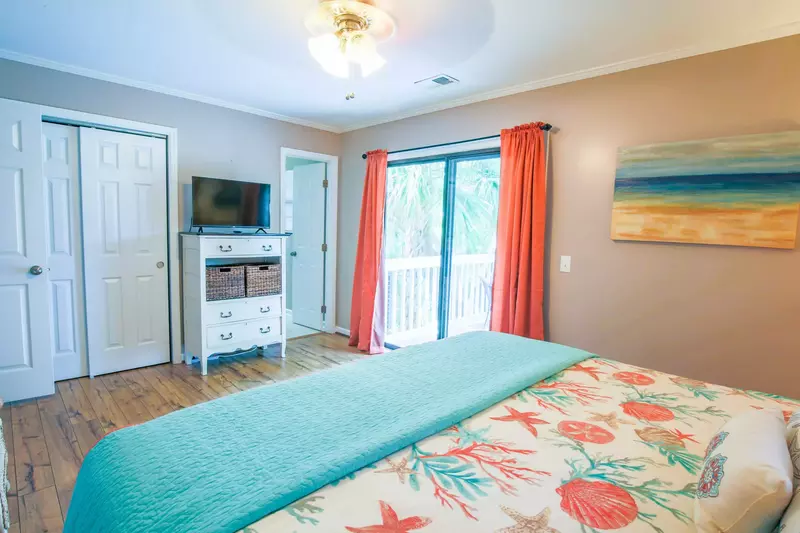 The master suite also has a smart TV, en suite bathroom and sliding door access to a private balcony.
