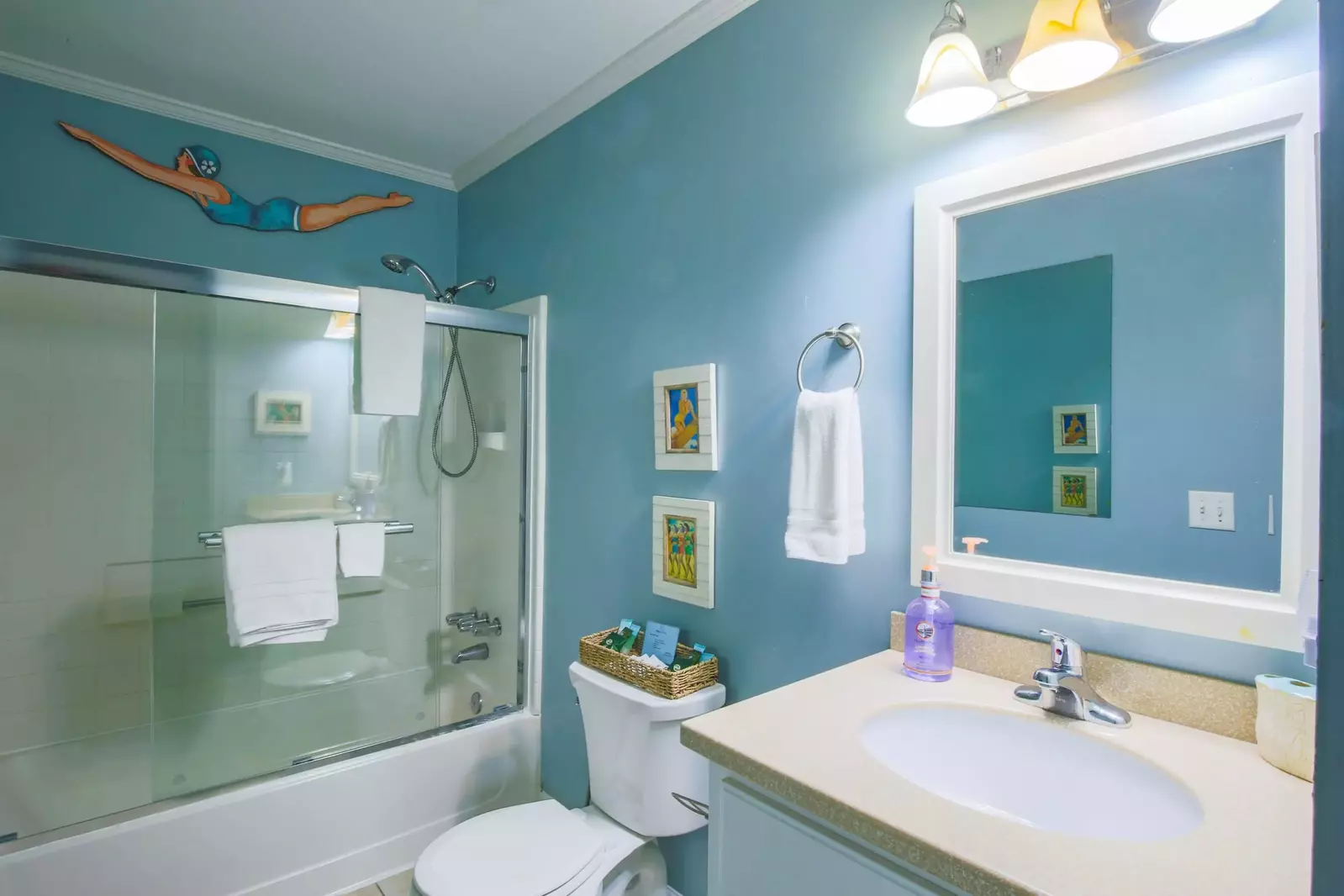 The bathtub and adjustable showerhead in the guest bathroom are perfect for bathing kiddos after a long day at the beach.