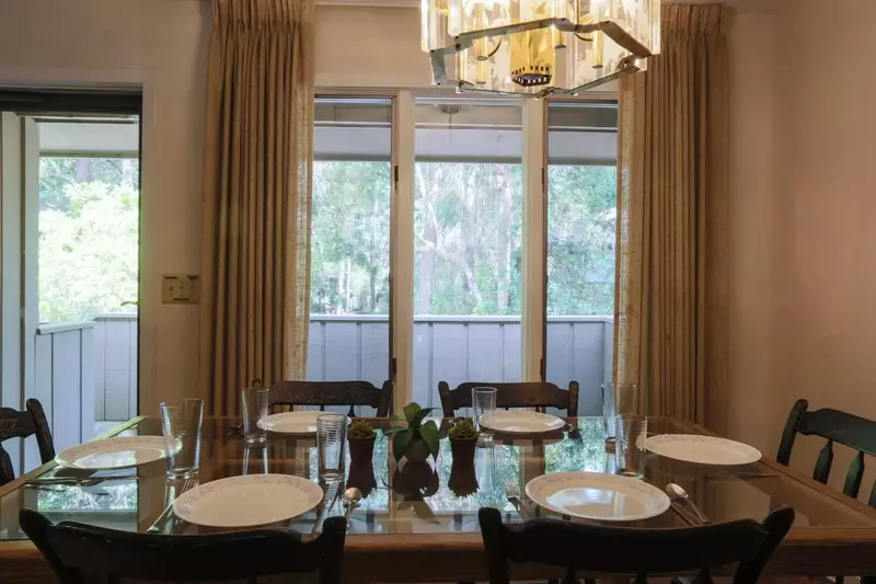 When you enter the home, you'll find this spacious dining table that seats up to 8.