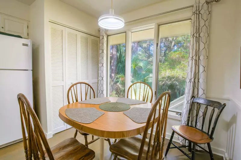 The dining table in the kitchen seats 4.