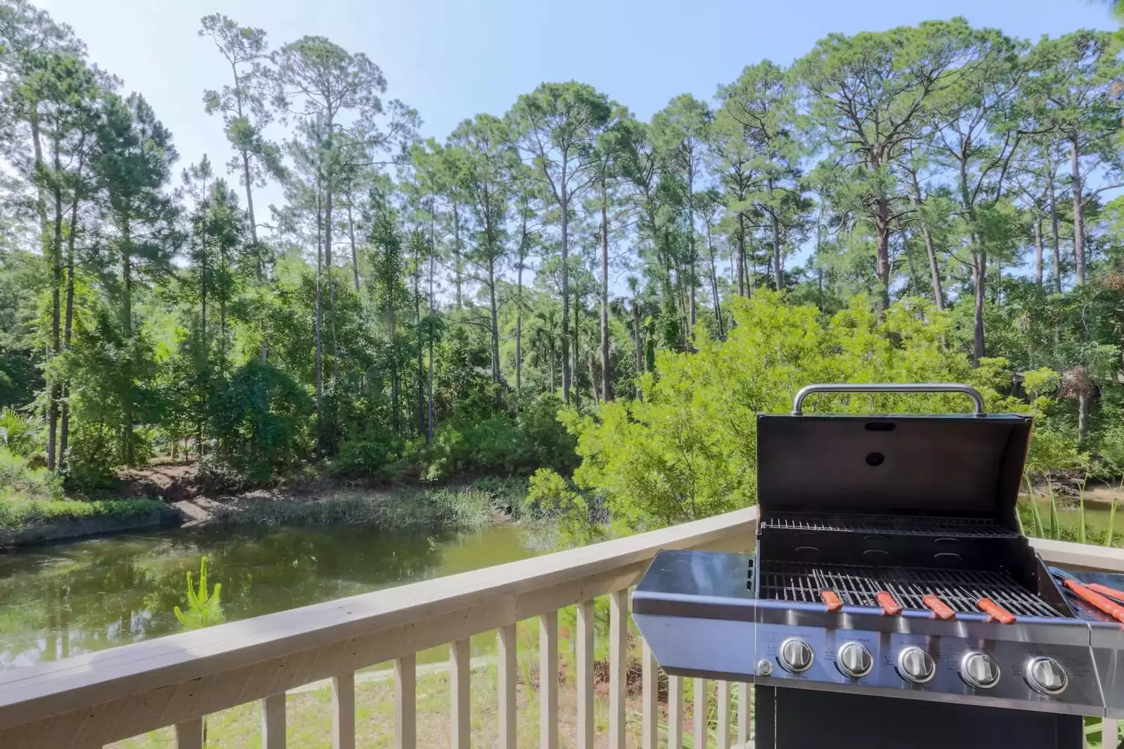 Fish and then cook what you catch on the BBQ grill on the porch!