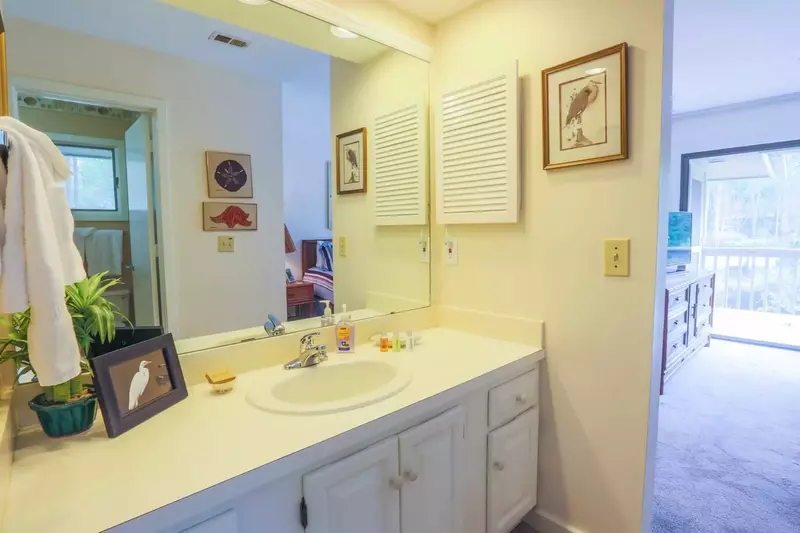 Enjoy the artwork in this freshly repainted bathroom.