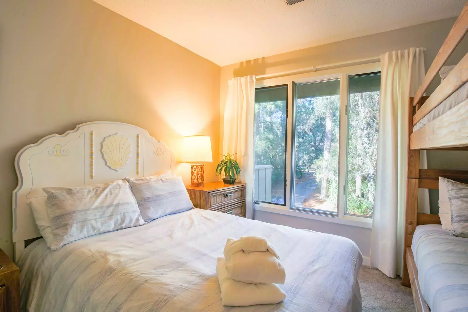 All of the bedrooms within Sprigg's Shack feature views of Kiawah Island's maritime forest.