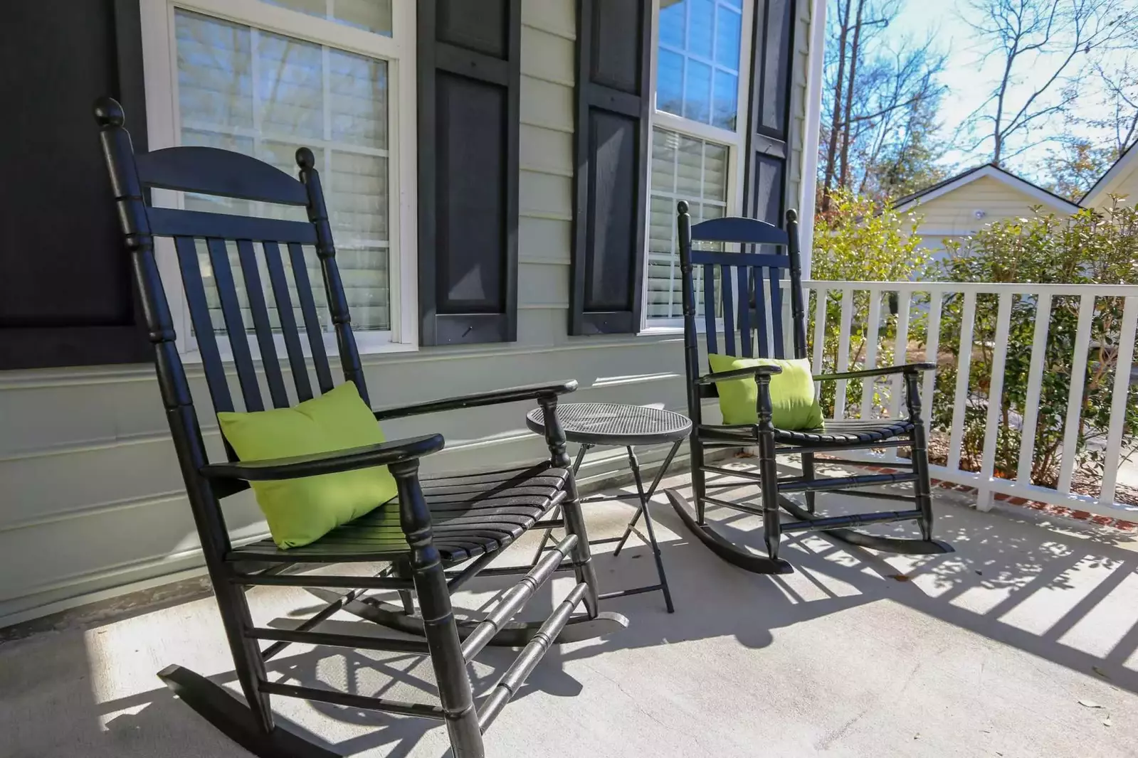 Two rocking chairs on the front porch welcome you home to Falling Moss.