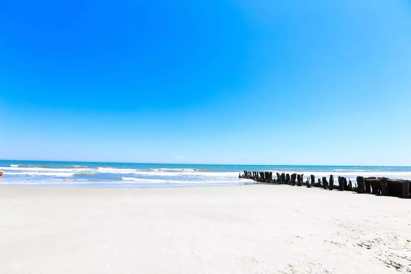 Sand castles, deep breaths and seashells await you....