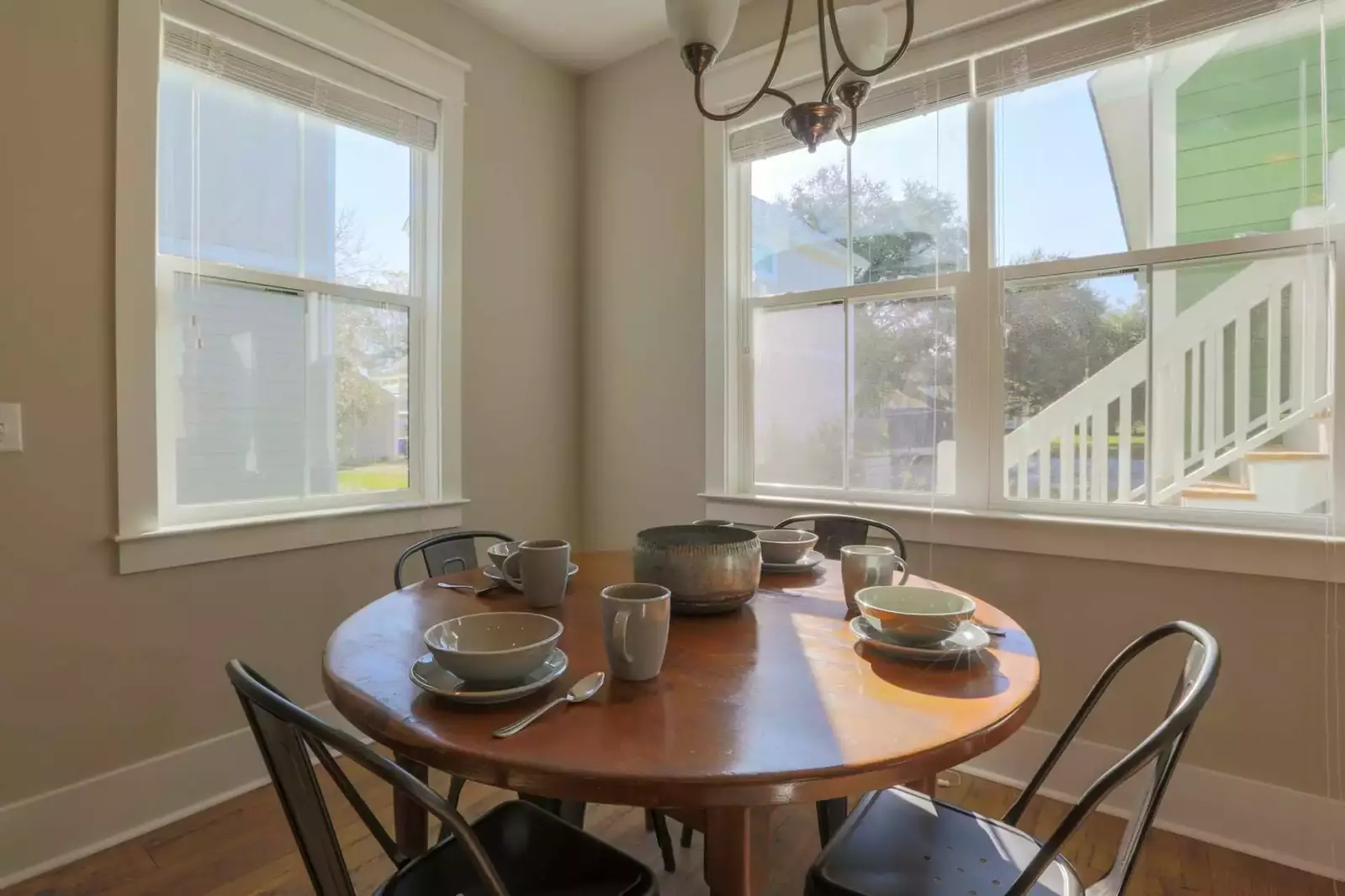 The dining table in the kitchen comfortably seats 4 people.