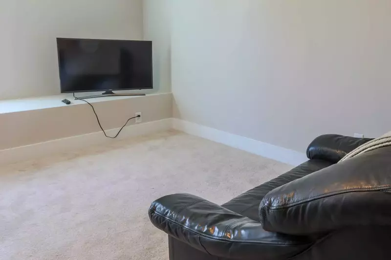 There's also a loveseat and TV in the third floor bonus room.