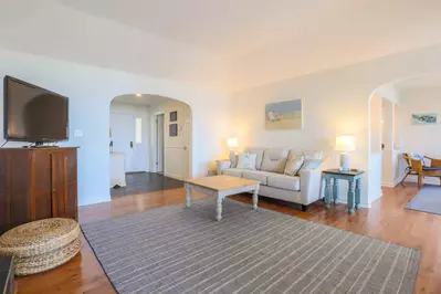 The family room connects to the foyer as well as the dining room.