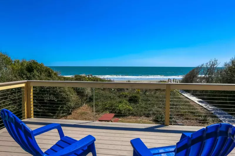 Enjoy the sights, sounds & breezes of the ocean on the home's fabulous sundeck.