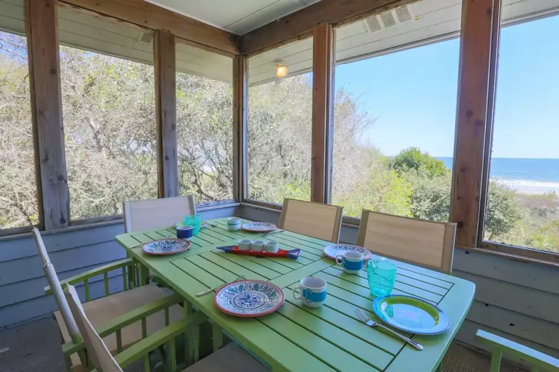Watch the waves crashing ashore from the dining table in the sun room.