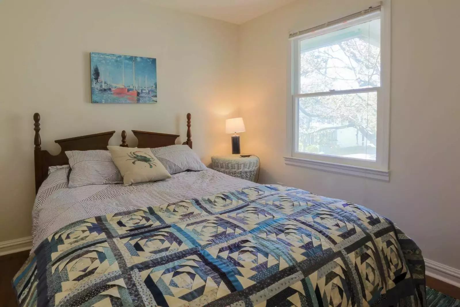 The queen guest bedroom overlooks the front of the house and E. Ashley Avenue.