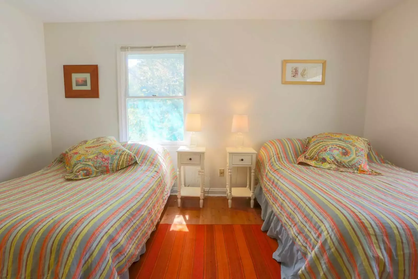 This guest bedroom, which sits on the front corner of the house, gets lovely afternoon sunlight.