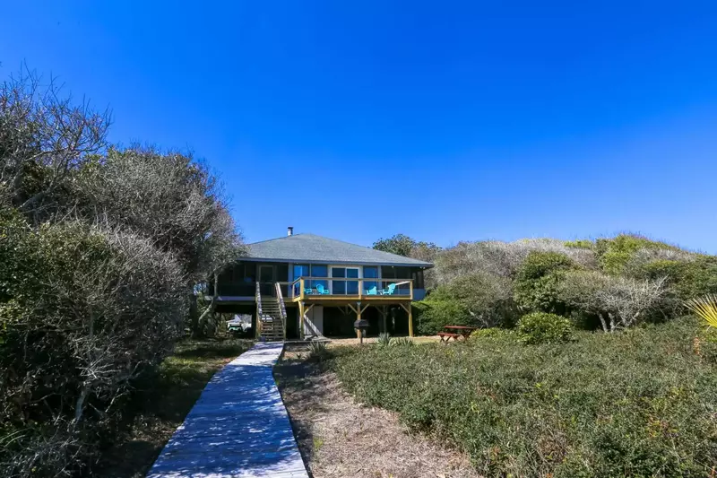 You'll walk back to the house from the beach on your own private beach access walkway.