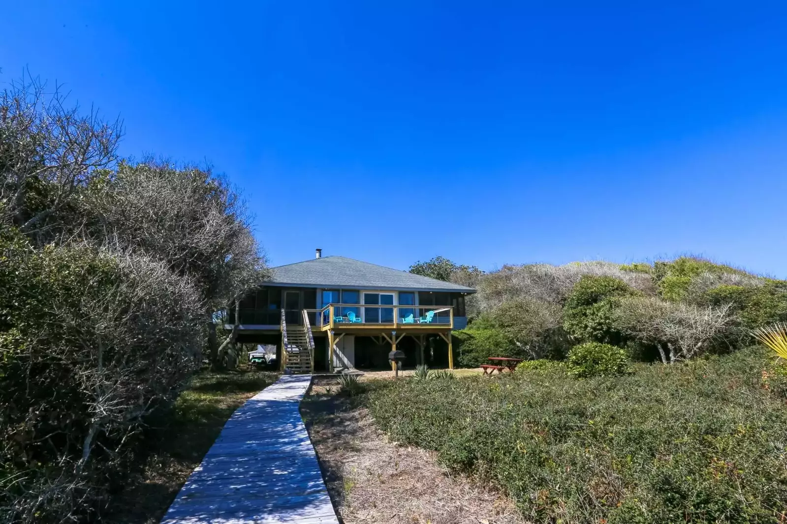 You'll walk back to the house from the beach on your own private beach access walkway.