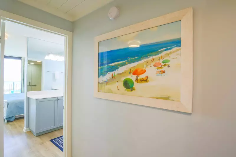 On the condo's upper level, you'll find a hallway that separates the master suite from the guest suite.