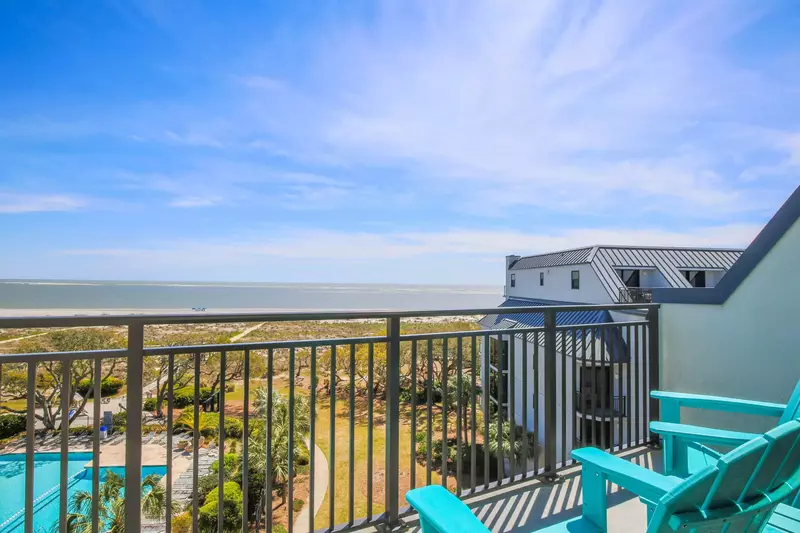 You'll find this seating area with ocean views on the private balcony off of the master suite.