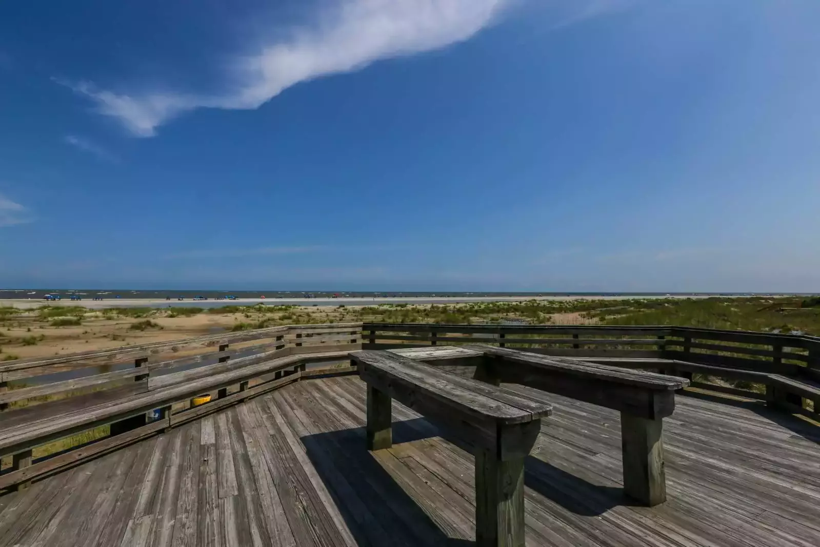 The community deck affords stunning views of the sand dunes, beach and Atlantic Ocean.