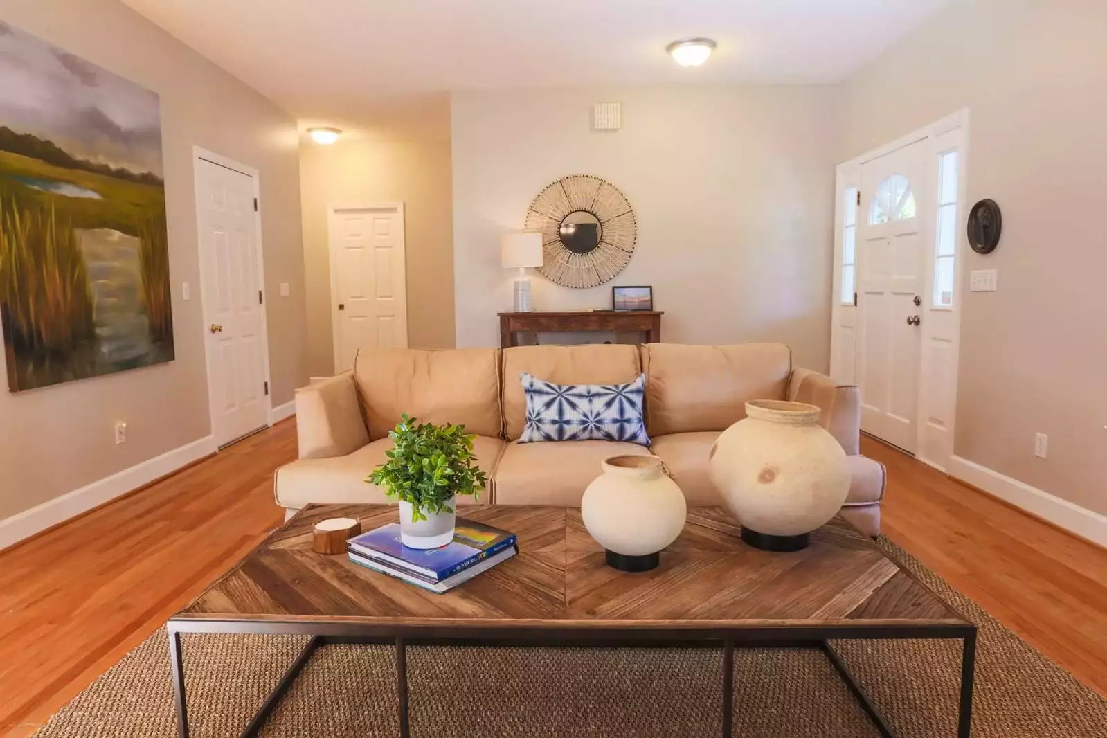 When you enter the front door, you'll find a comfortable living room with hardwood floors.