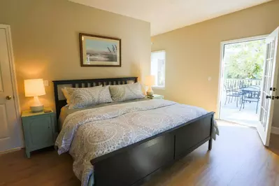 The back porch connects to both the dining room and the master bedroom.