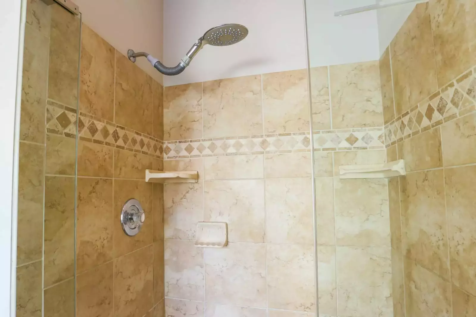 The en suite bathroom in the master bedroom also has a separate walk-in shower.