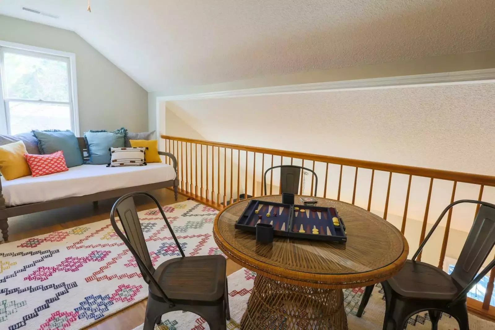 The second floor balcony is the perfect spot for playing games or reading a book.