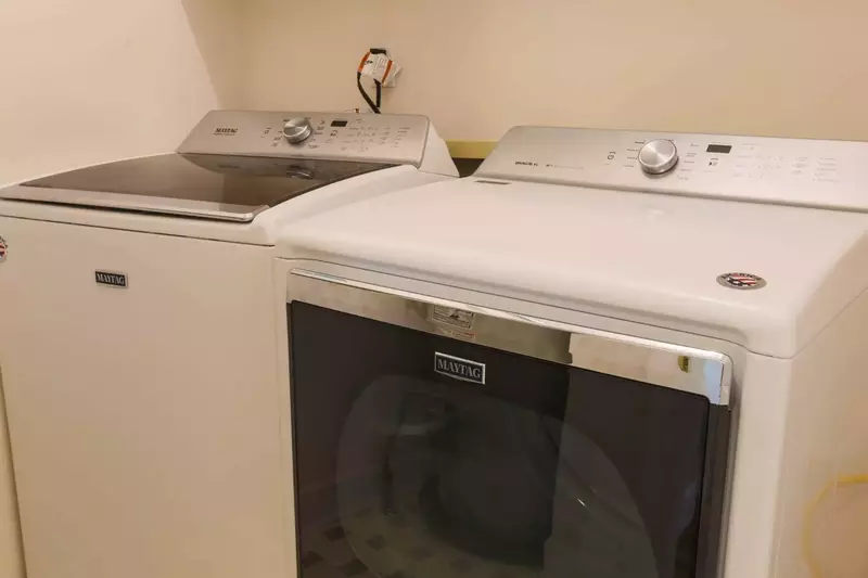 There's a full sized washer and dryer on the first floor of the home.