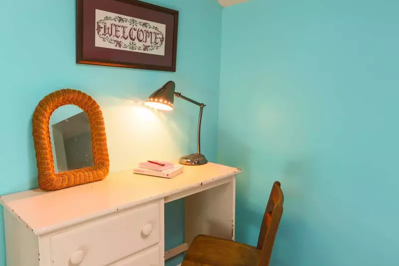 There is a small desk in the loft bedroom.