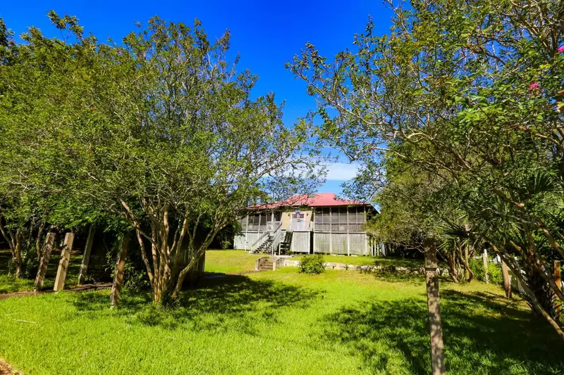 Decked Out sits on a large, 1 acre lot with a spacious front yard.