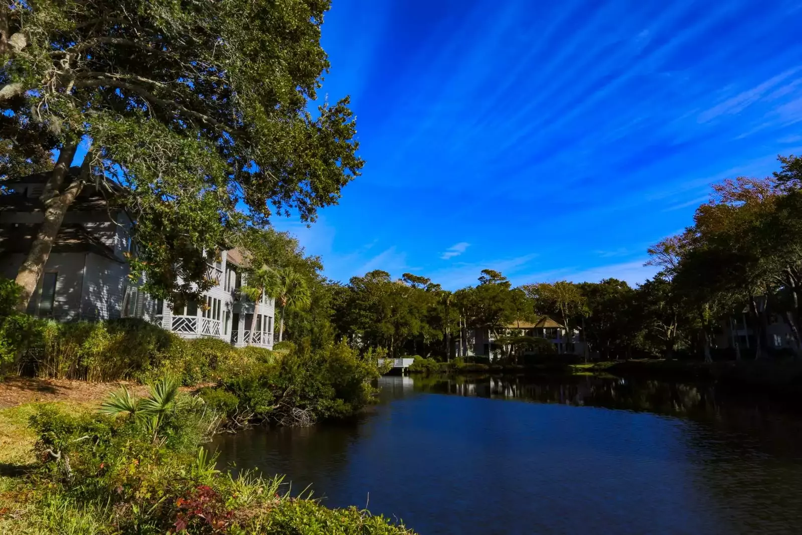 Blue Pearl is located alongside a tranquil blue lagoon in Turtle Cove Villas.