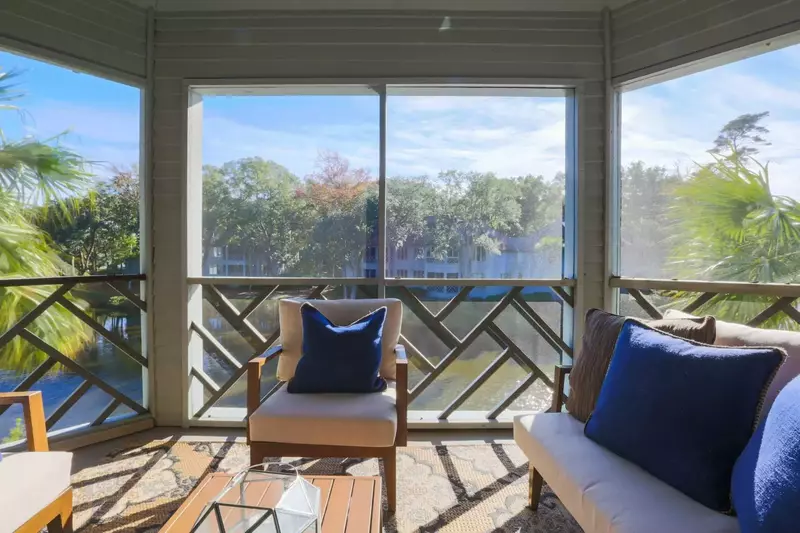Sit with the palmetto trees' fronds in this second floor perch over the lagoon.