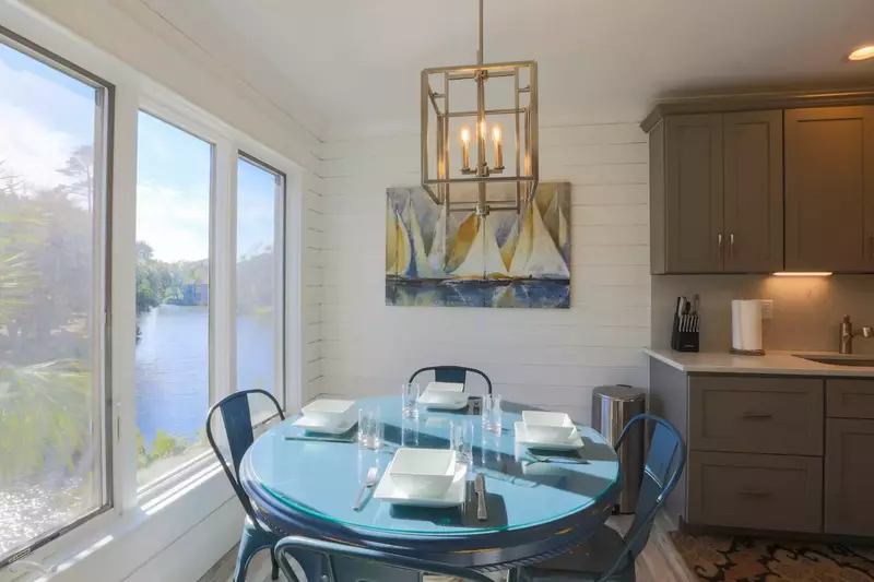 The kitchen and dining areas also enjoy views of the lagoon below.