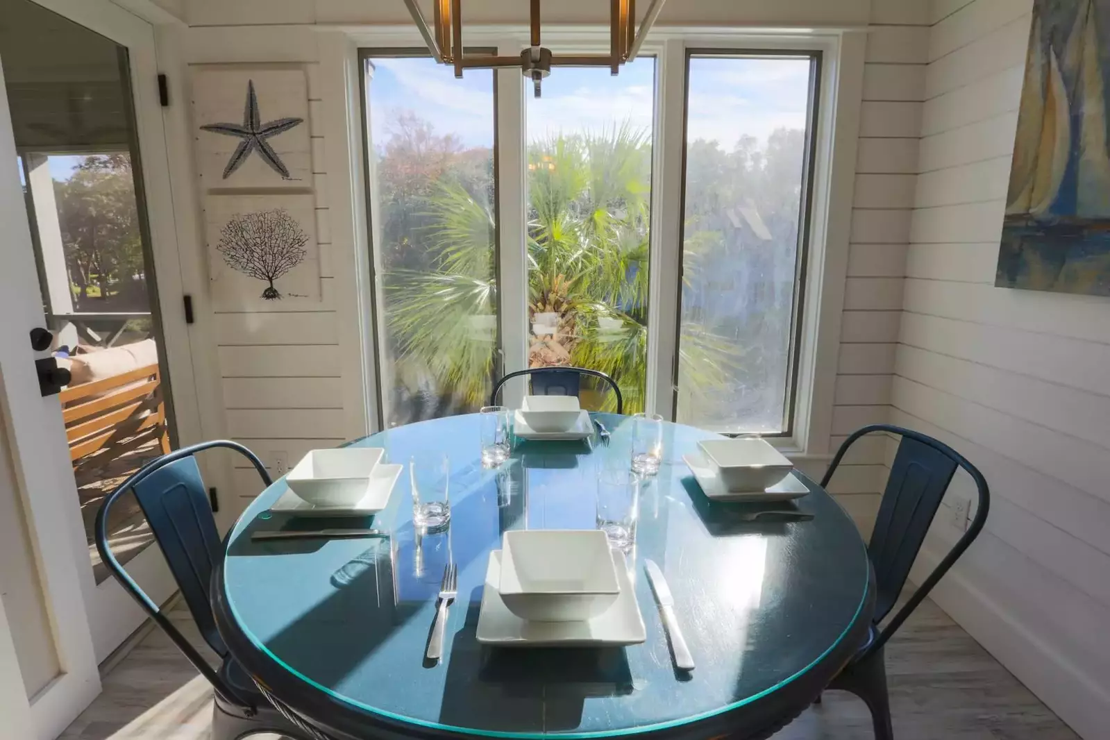 The dining room table comfortably seats 4 people.  There is additional seating at the kitchen bar.