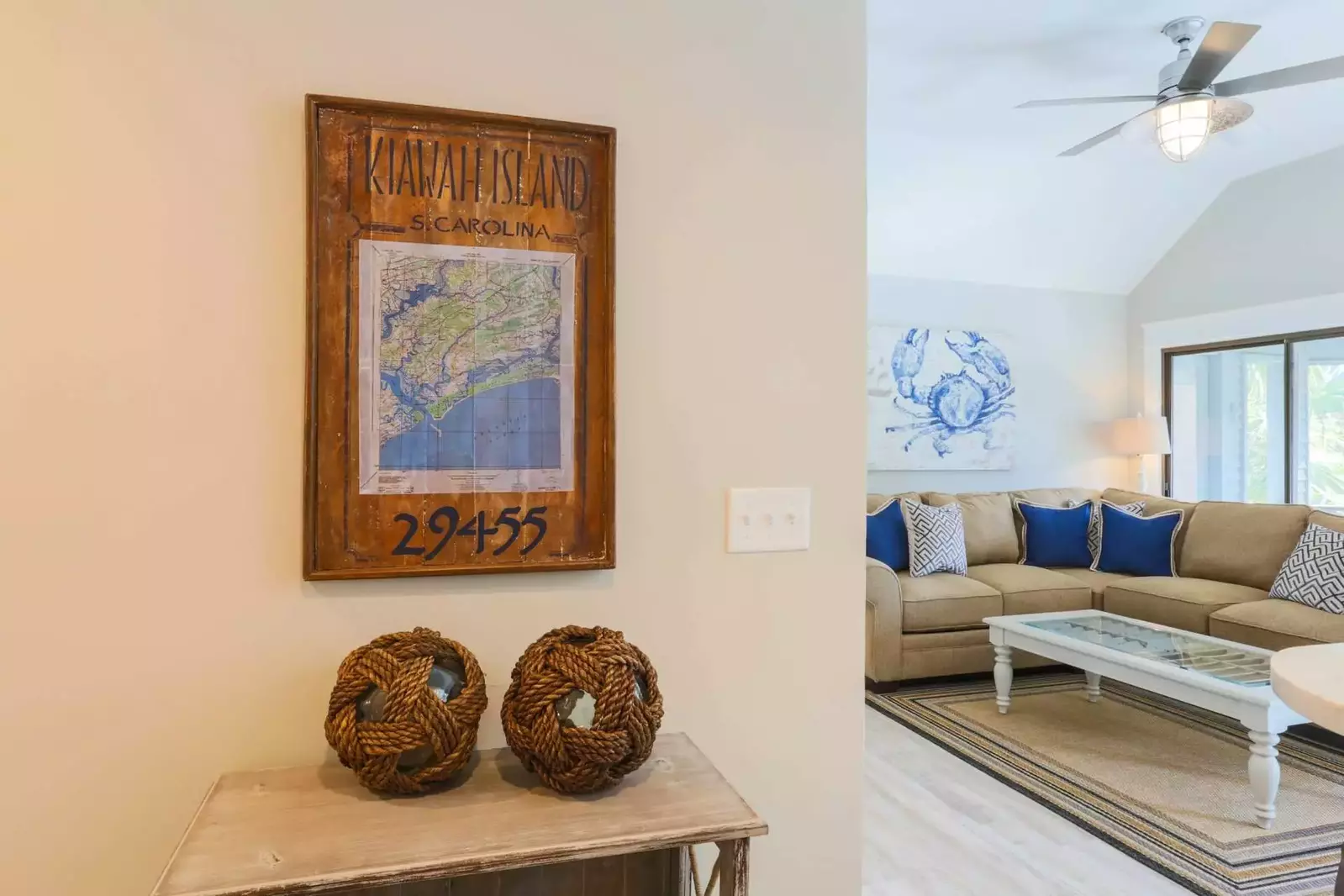 The guest bedroom is located off a small hallway from the living room.