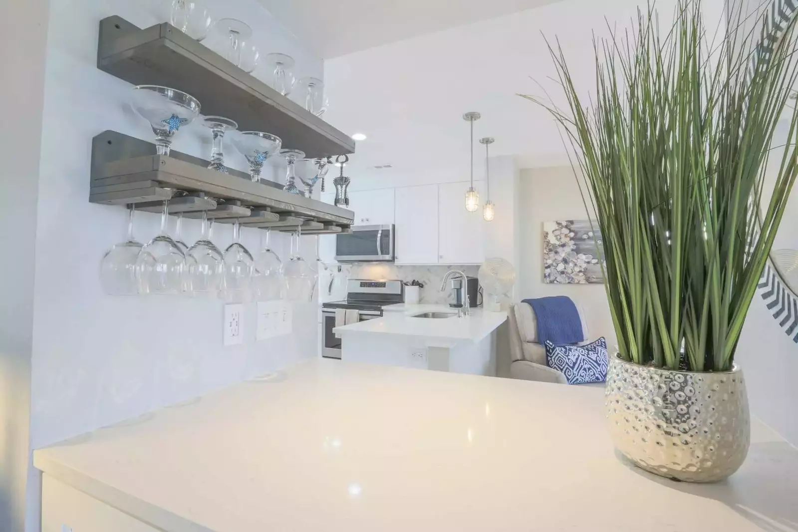 This is the view of the kitchen and living room from the central hallway.