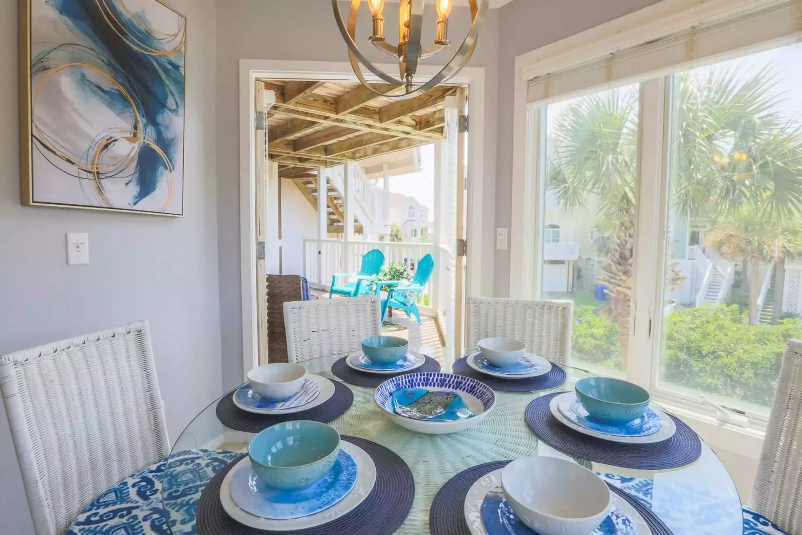 These French doors open onto the condo's gated front porch.