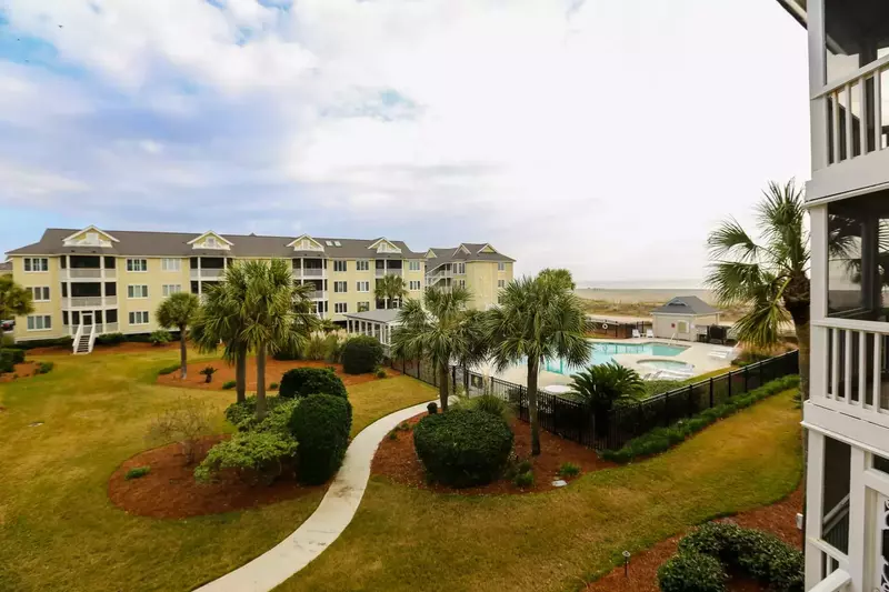 This is the view of the community pool and Atlantic Ocean from the master bedroom.