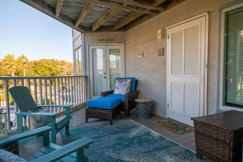 Flip Flop Fun also has this terrific covered porch on the front side of the condo.