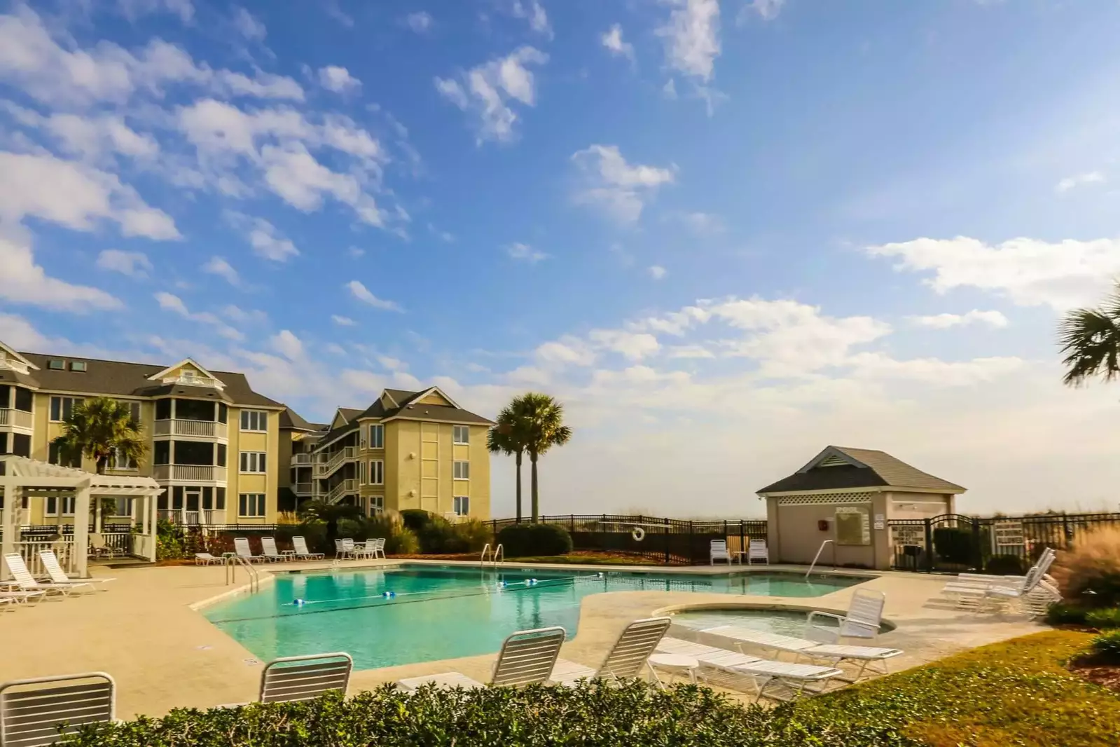 This pool area also features a kiddie pool, new gazebo and pool house with rinsing station.