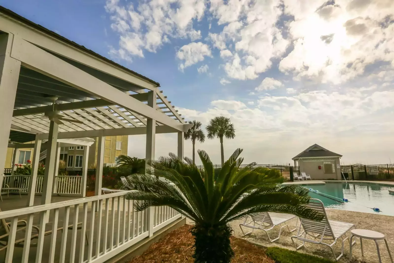 The gazebo provides the perfect opportunity to view the pool area from the shade.
