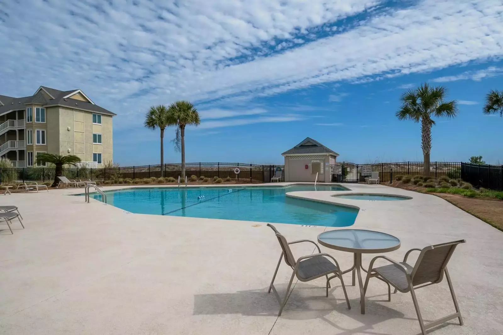 There are dining tables & chairs as well as a community grill available for your use.
