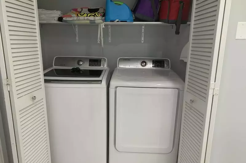 The home has a full size washer & dryer in the closet by the kitchen