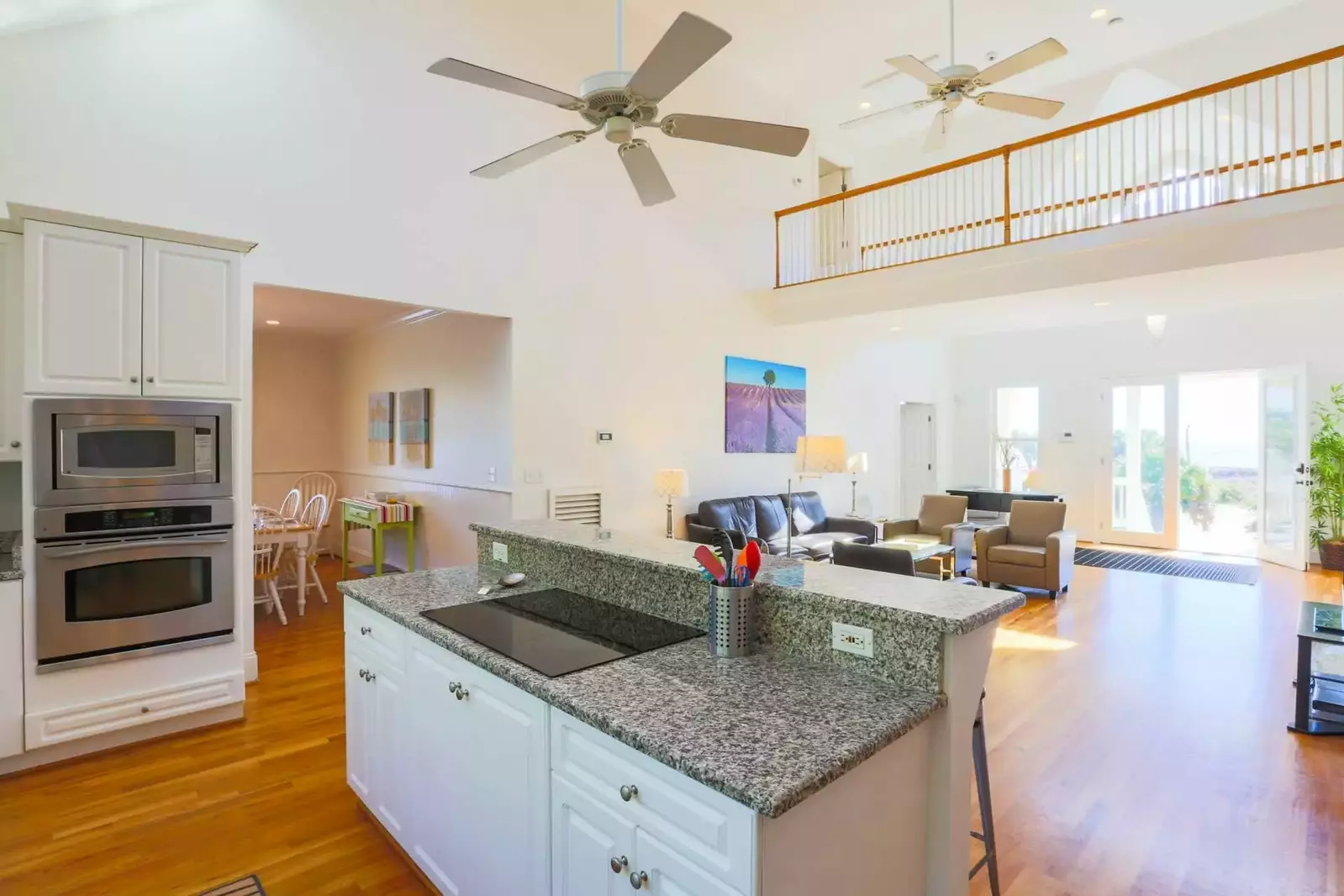 The kitchen island also holds the electric cooktop.