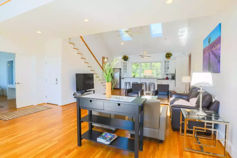 There are 2 bedrooms on the ground floor - one on each side of the living room.
