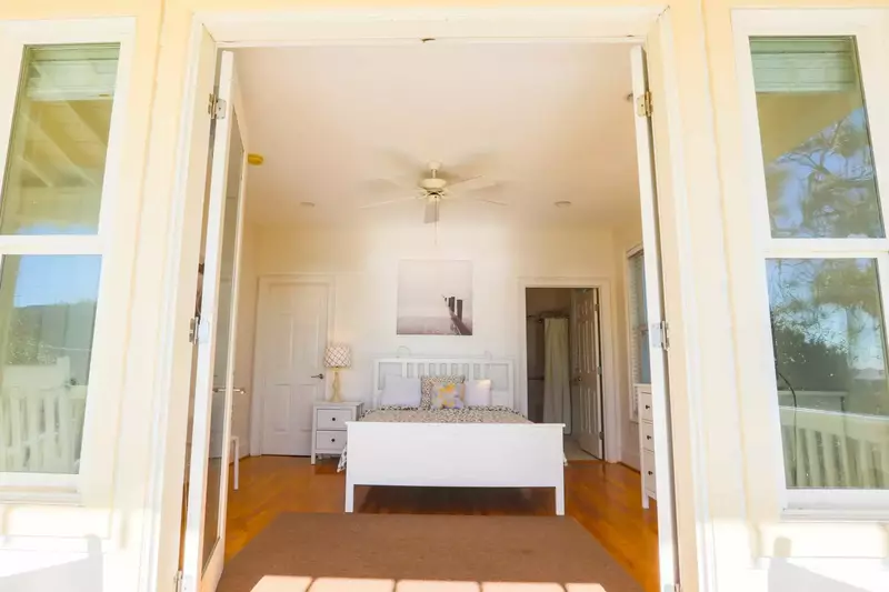 This bedroom, which is located on the first floor of the home, has a handicap accessible en suite bathroom.