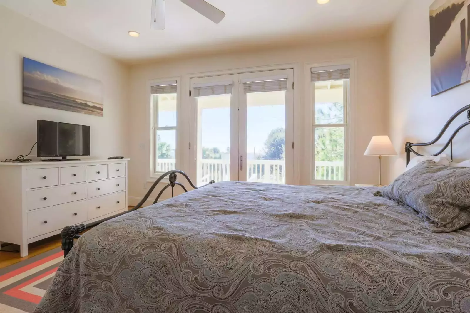 The master bedroom features a king size bed, ocean views and cable TV.