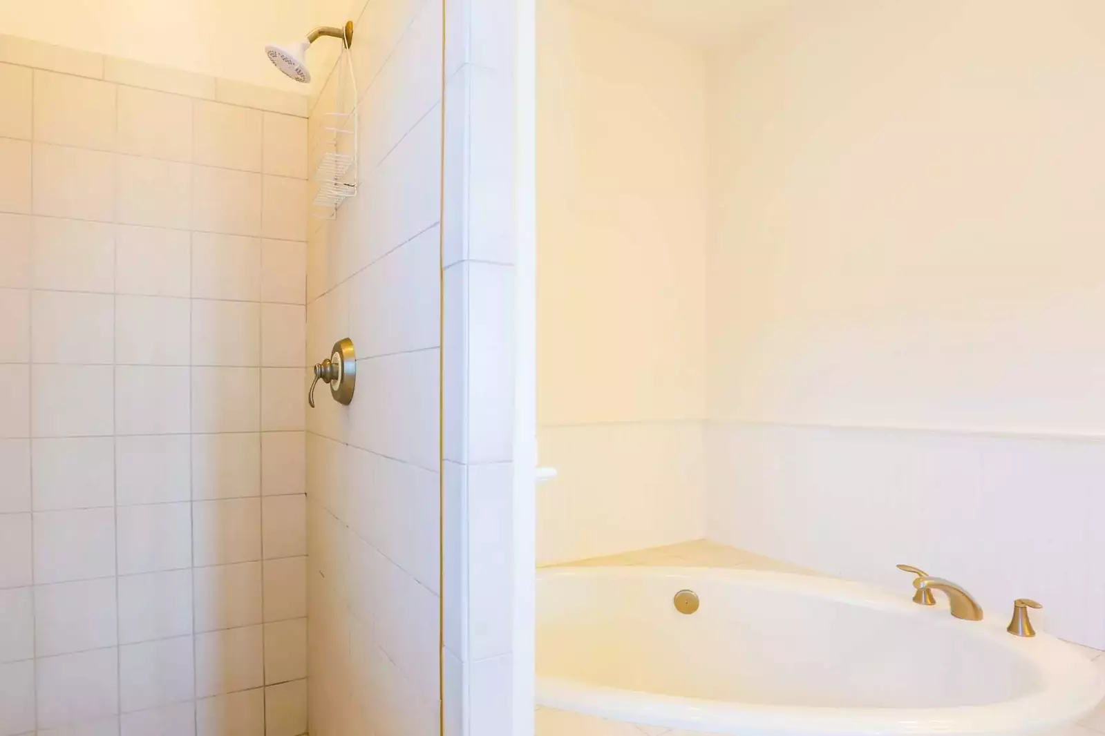 There is also a separate walk-in, tiled shower in the master bathroom.