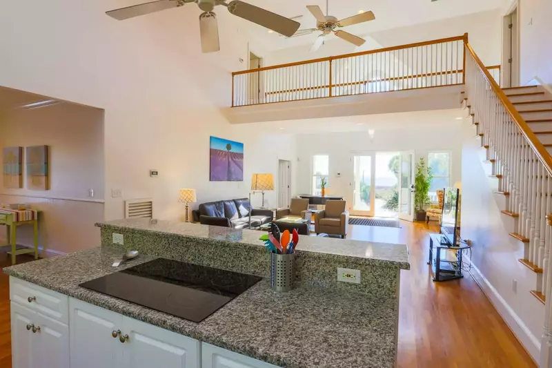 This stairwell takes you from the kitchen area to the two guest bedrooms on the second floor.
