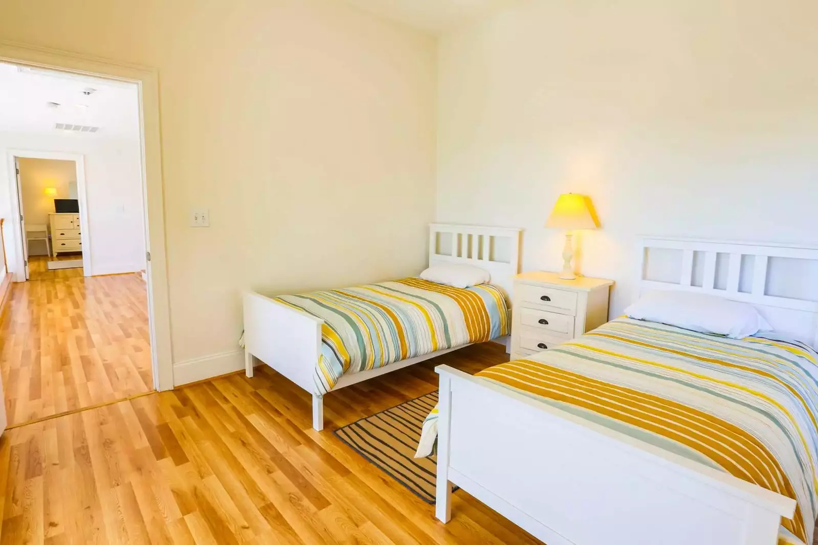 The home's fourth bedroom is located across the second floor hallway.