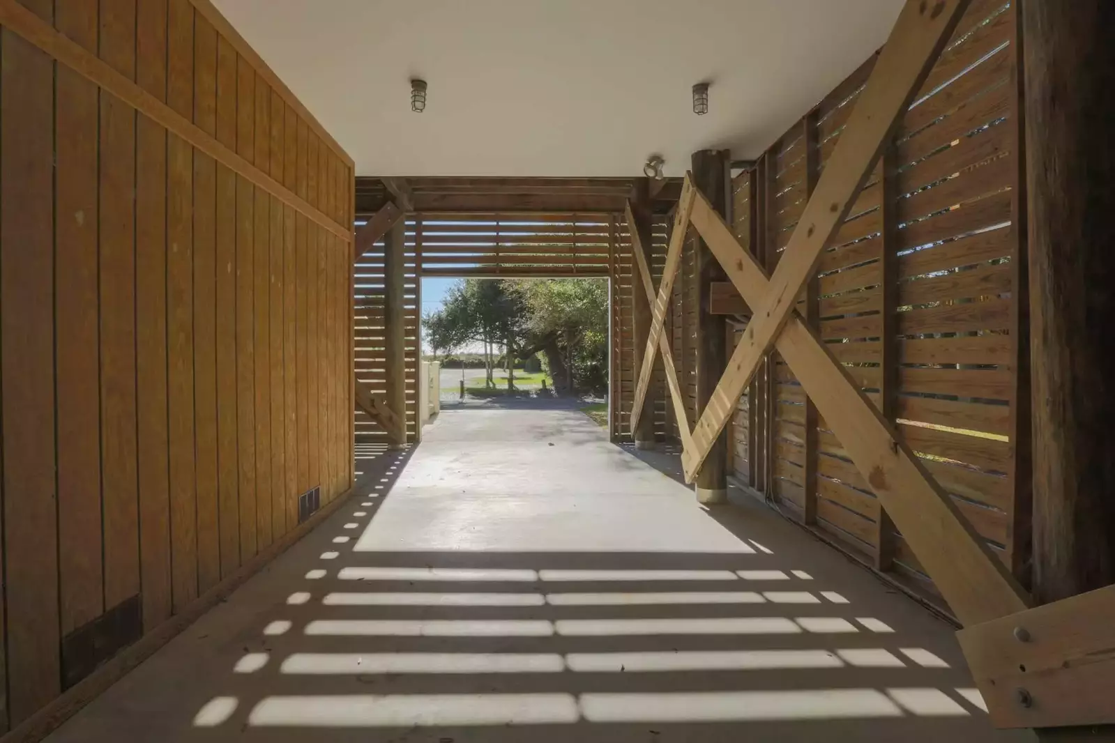 There is ample room in the covered carport to park your cars.
